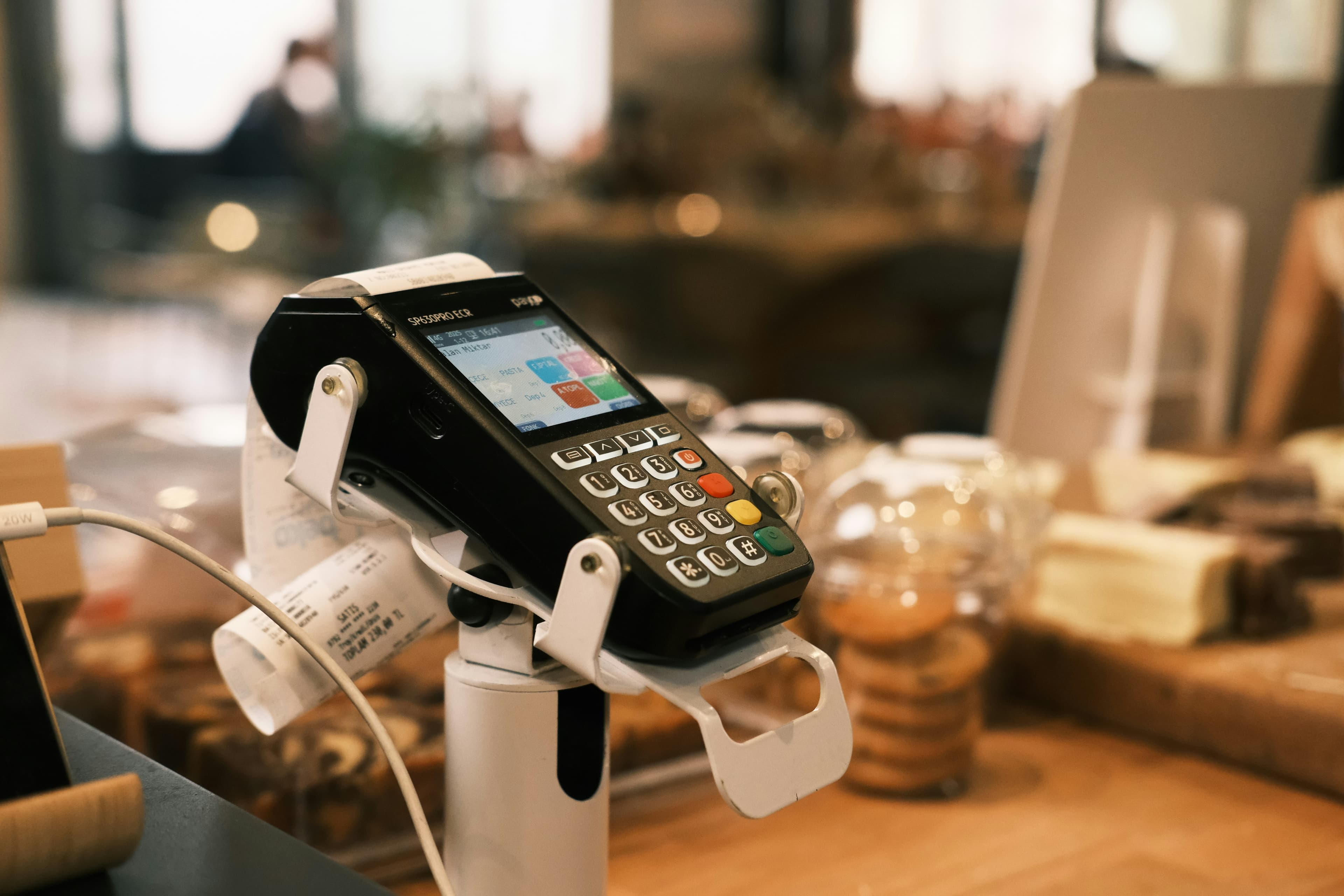 Shop checkout counter with a payment terminal